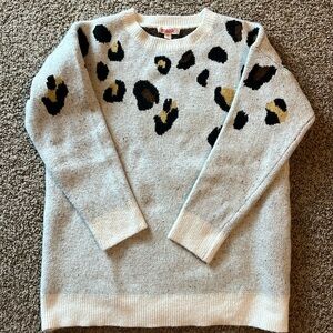 Oversized women’s sweater.   Cream with Leopard spots.  Size Medium.